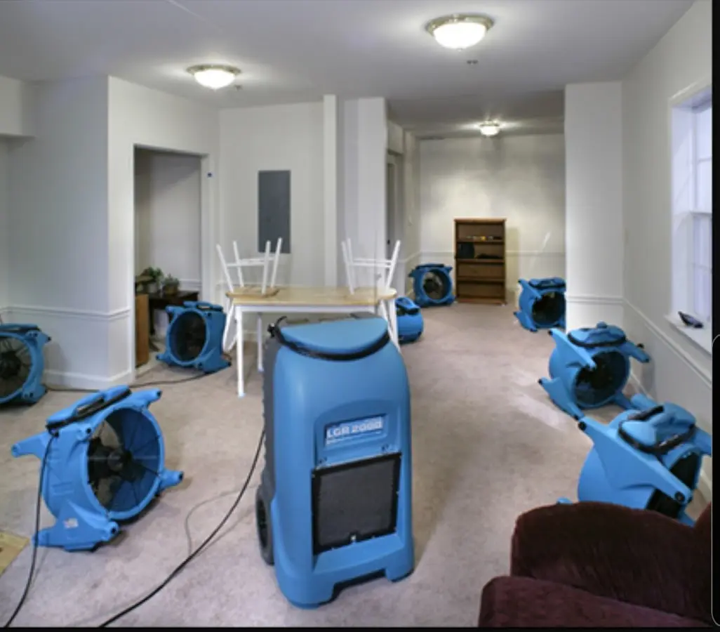 Air movers and dehumidifier setup for Water Damage Restoration in Redan